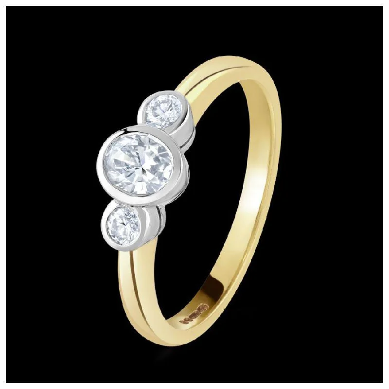 18ct Gold yellow and white gold rubover set oval cut Diamond and round brilliant cut Diamond 3 stone