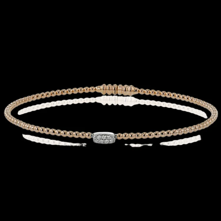 Women’s nature-inspired bangles-Simple and sweet, this 18k white and rose gold bangle is perfect worn alone or stacked and features .04cttw diamonds.