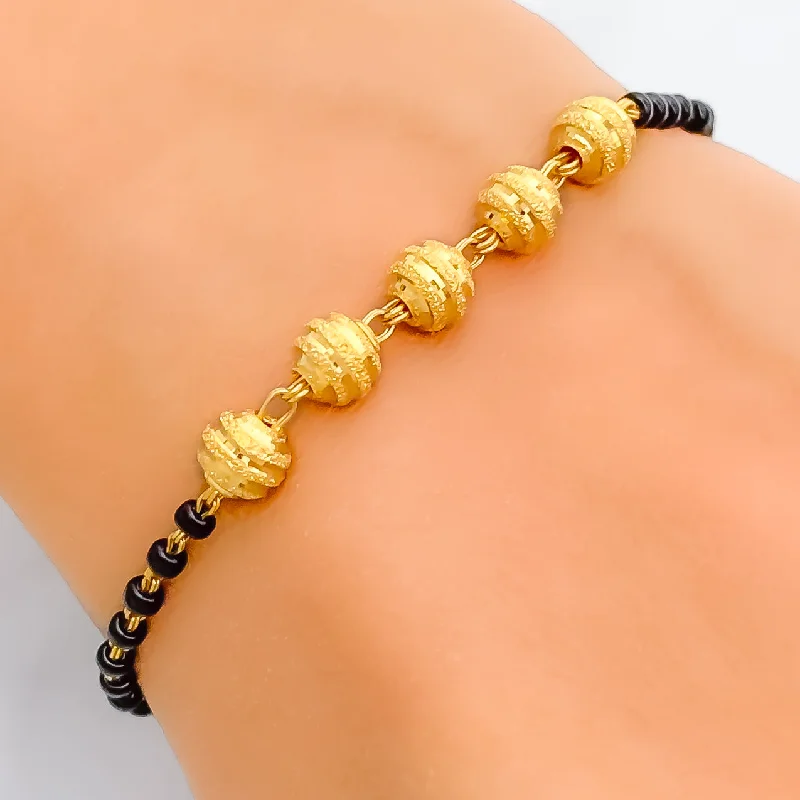 Women’s holiday bracelets-Lovely Multi-Orb 22k Gold Black Bead Bracelet