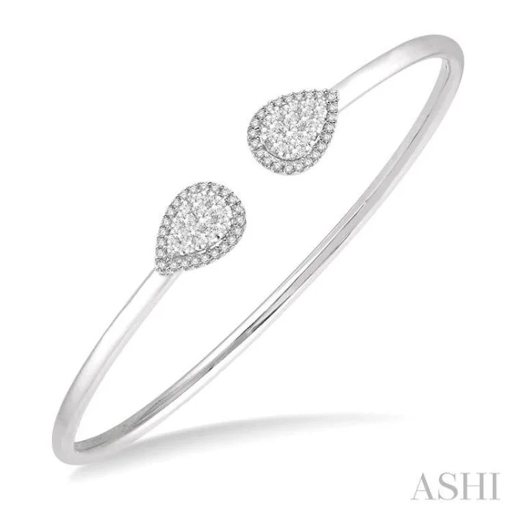 Women’s stackable bangles-5/8 Ctw Pear Shape Lovebright Open Cuff Diamond Bangle in 14K White Gold