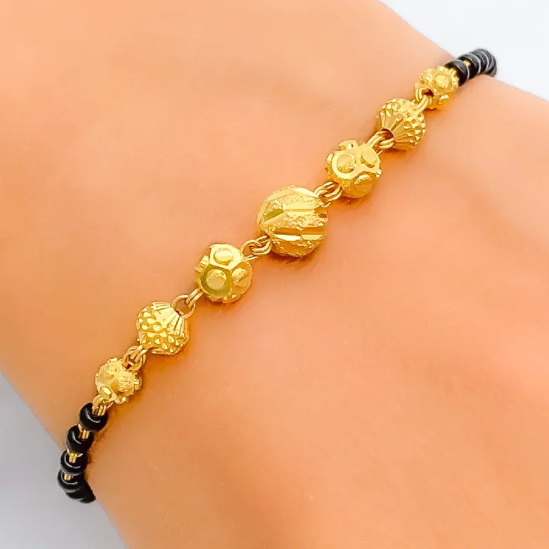 Women’s modern bracelets-Tasteful Exclusive 22k Gold Black Bead Bracelet