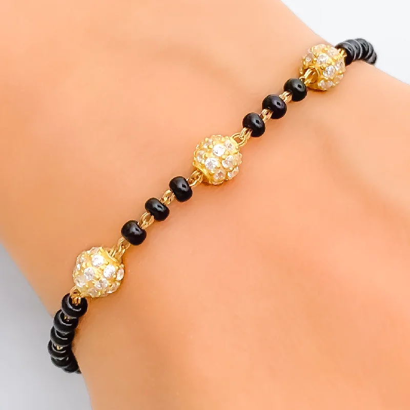 Women’s gold-plated bracelets-Elegant Orb 22k Gold Black Bead Bracelet