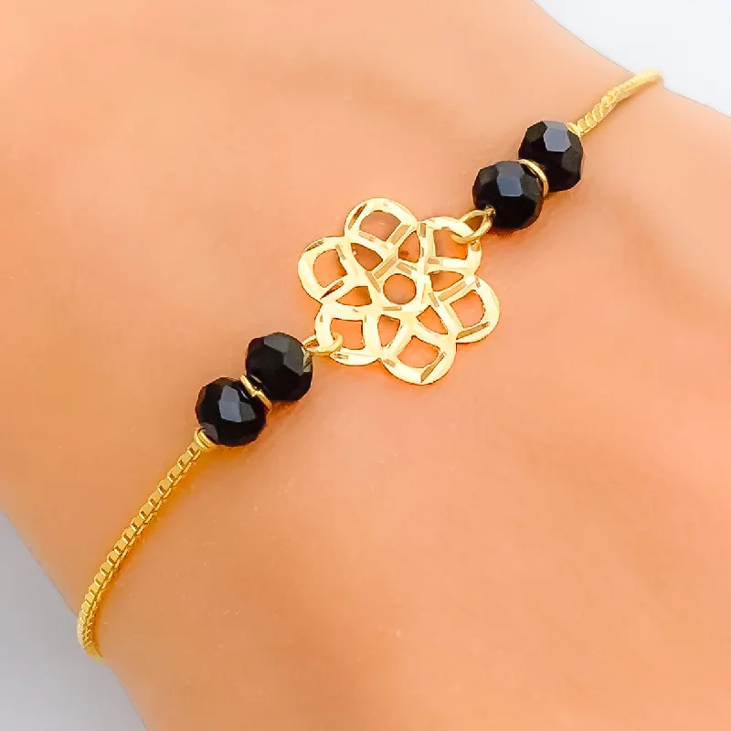 Women’s chic bangles-Dazzling Flower 22k Gold Black Bead Bracelet