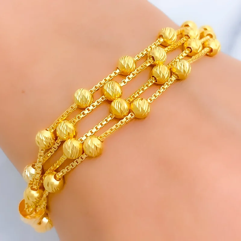 Women’s adjustable bracelets-Elevated Reversible Orb 22k Gold Bangle Bracelet