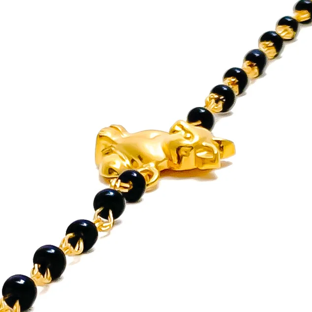 Women’s oversized bangles-Charming Ethereal 22k Gold Black Bead Baby Bracelet