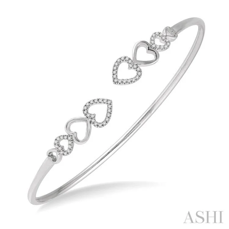 Women’s crystal bangles-1/4 ctw Heart Charm Open Center Round Cut Diamond Flexi Bangle in 10K White Gold